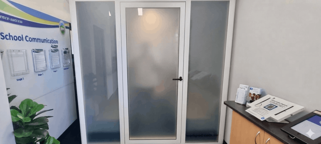 Large office pod with privacy glass in school foyer by workpod