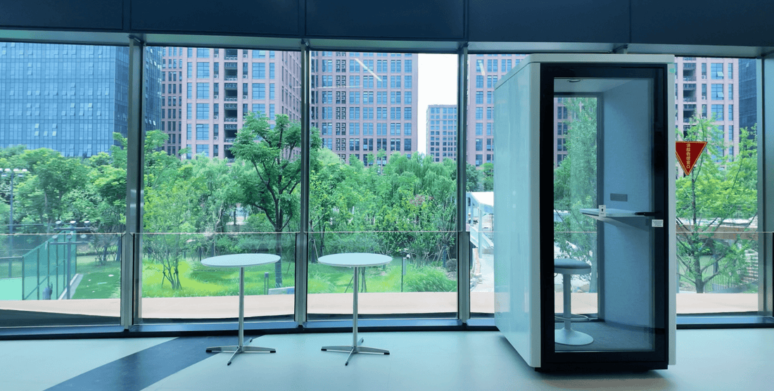 PAXTON Small phone booth white with black frame near office windows