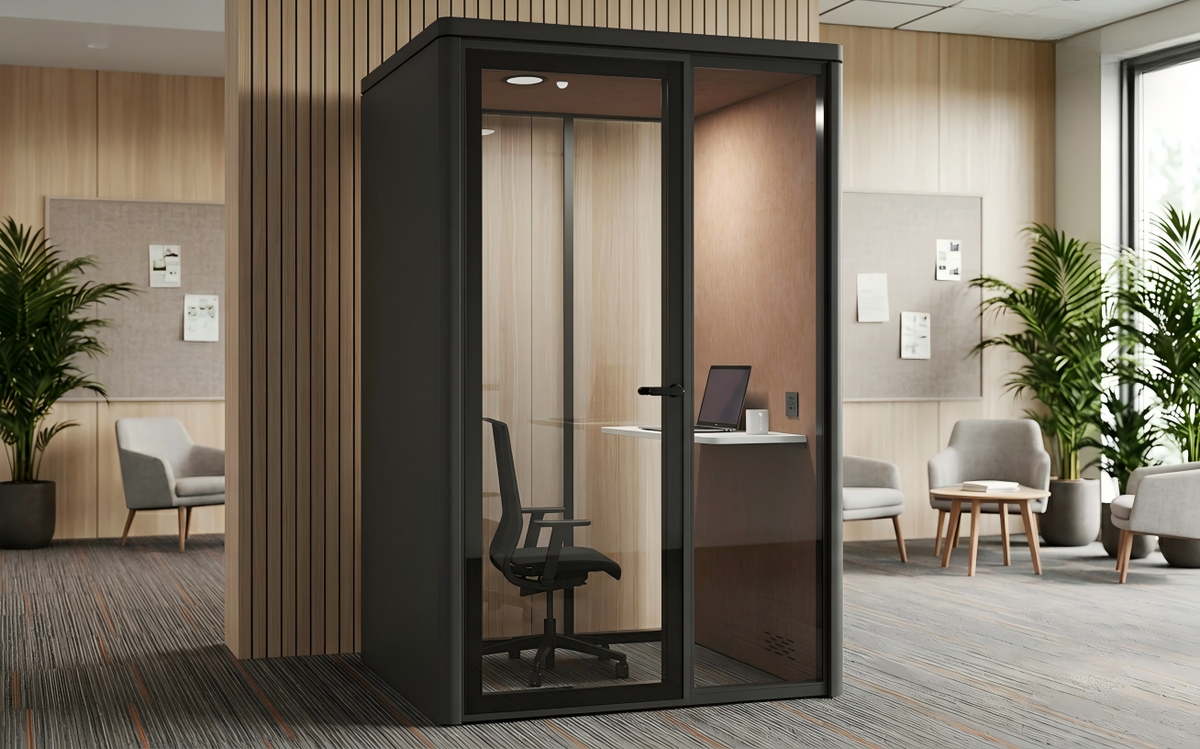 paxton small-wide office pod with desk and chair in an office setting