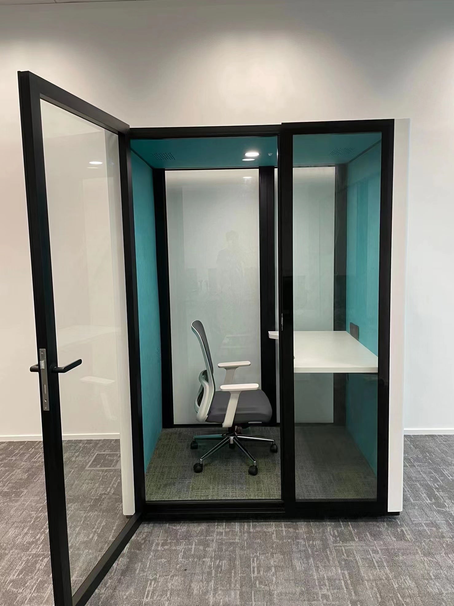 Office work pod white with aqua and door open