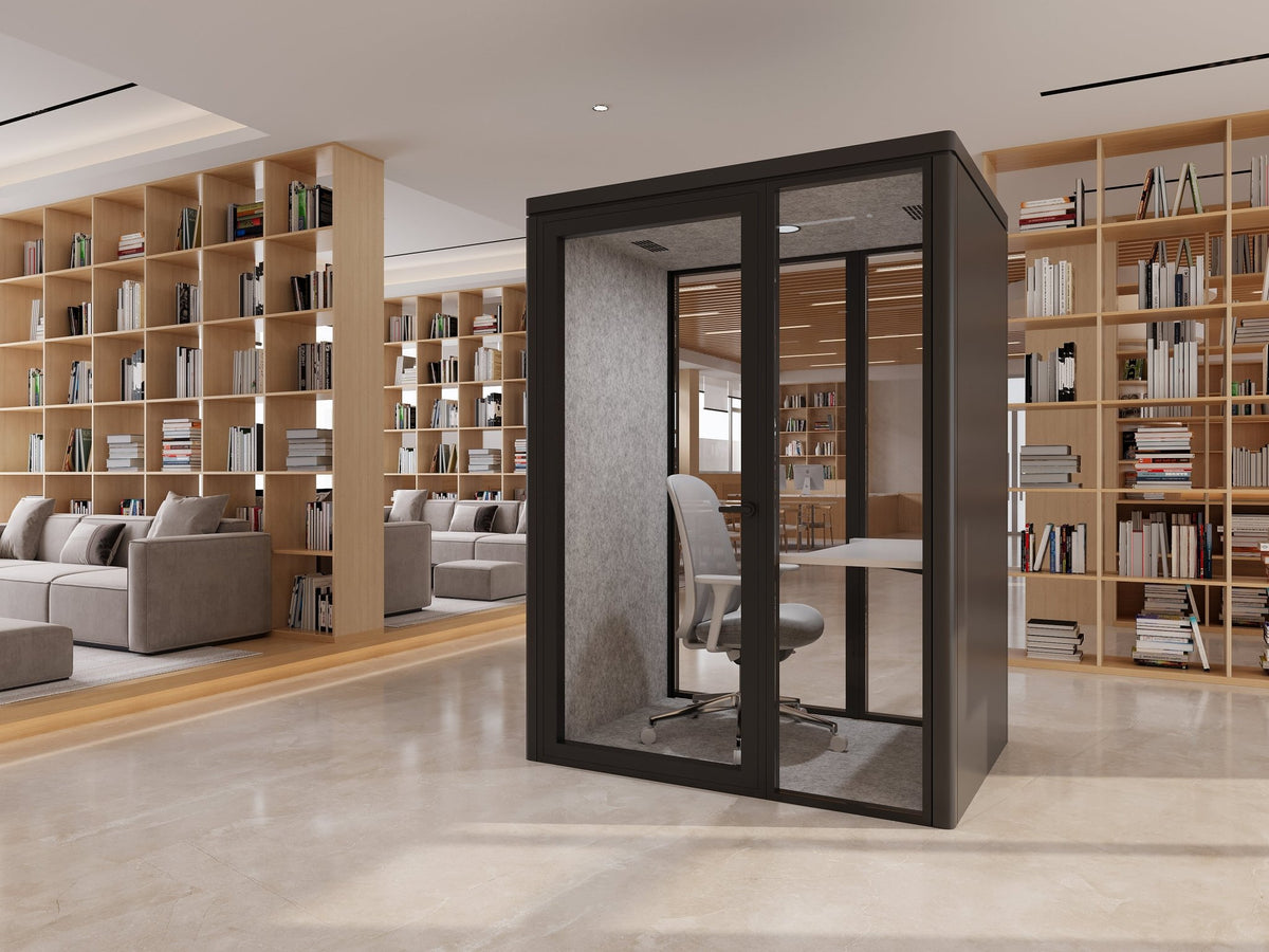 small grey and camel office work pod in a library setting