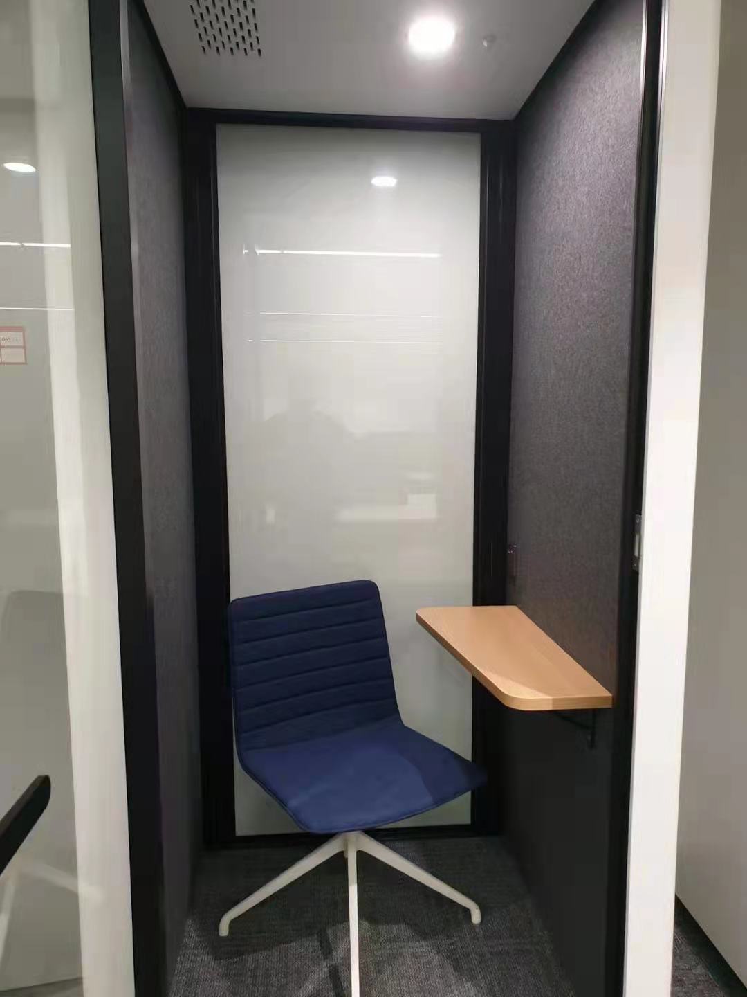 small work pod with blue office chair