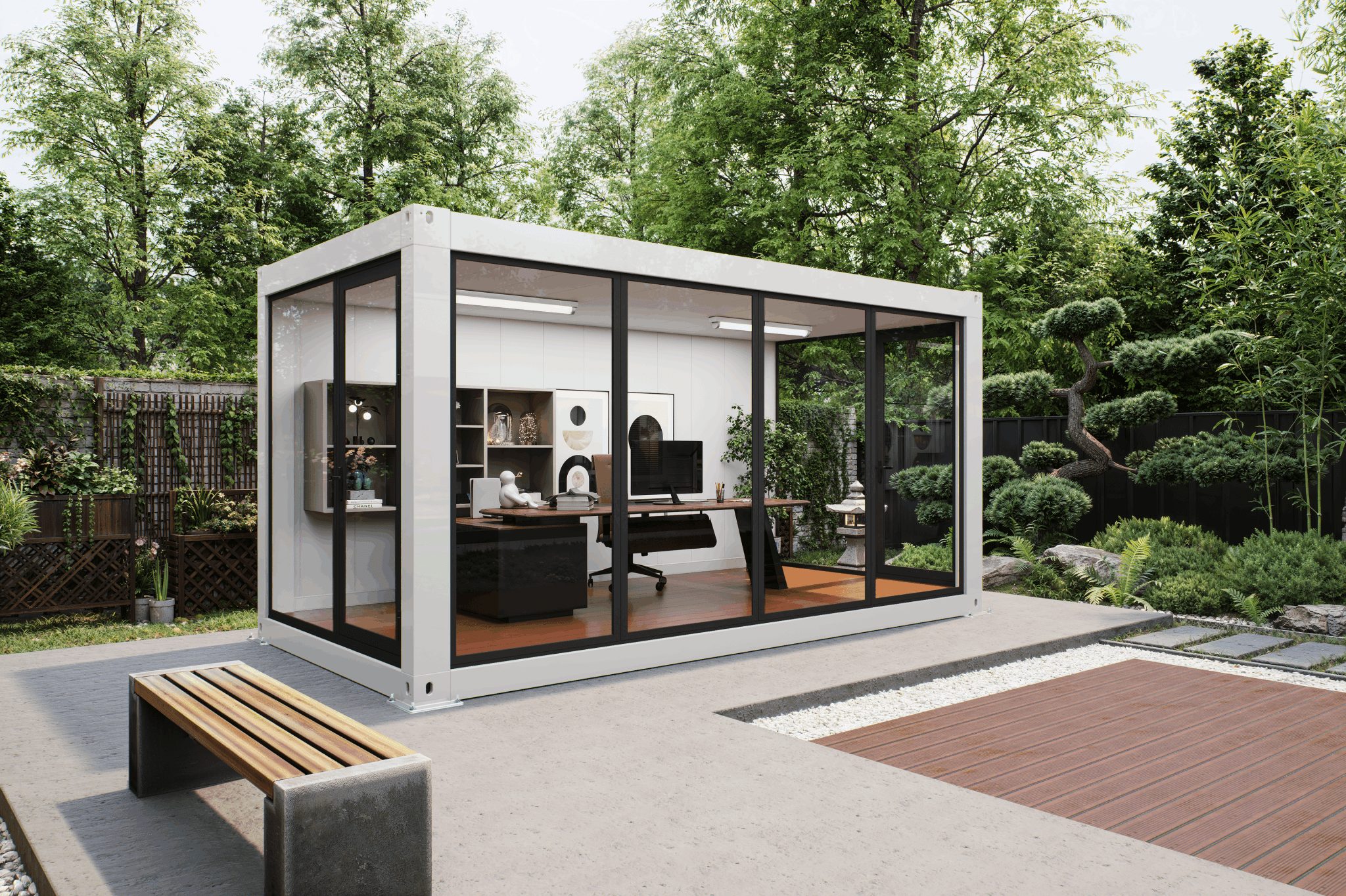 A modern modular office pod with a white container frame, black metal framing, and large glass windows, shown on a concrete patio in a landscaped garden setting.