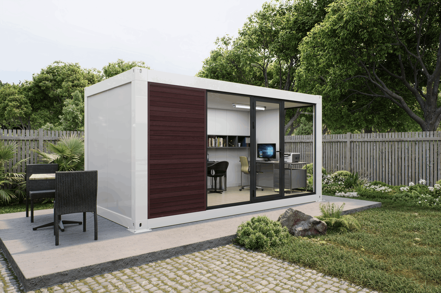 A modern shipping container office pod with a white exterior, dark brown sliding panel, and large glass windows, shown in a landscaped backyard setting.