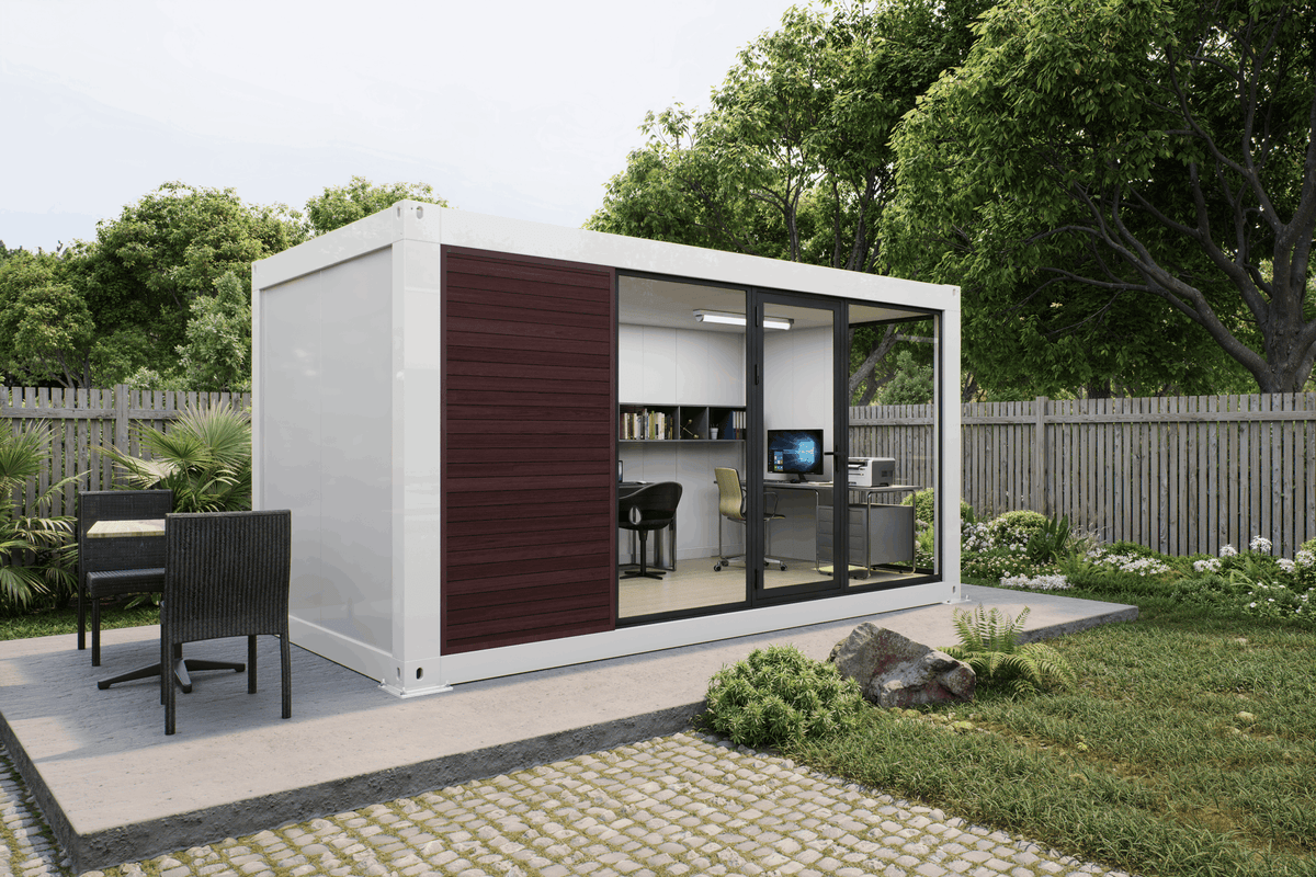 A modern shipping container office pod with a white exterior, dark brown sliding panel, and large glass windows, shown in a landscaped backyard setting.
